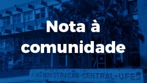 Cartaz com a inscrição "Nota à comunidade" e uma foto da reitoria ao fundo, em tons de azul